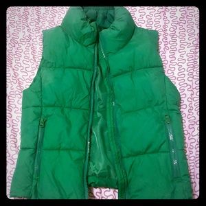 Green down-filled puffer vest.